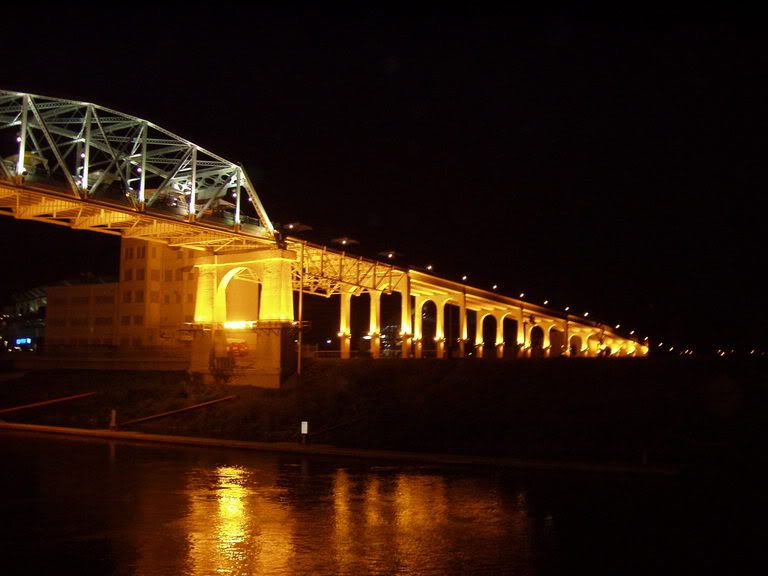 Lighted bridge at night