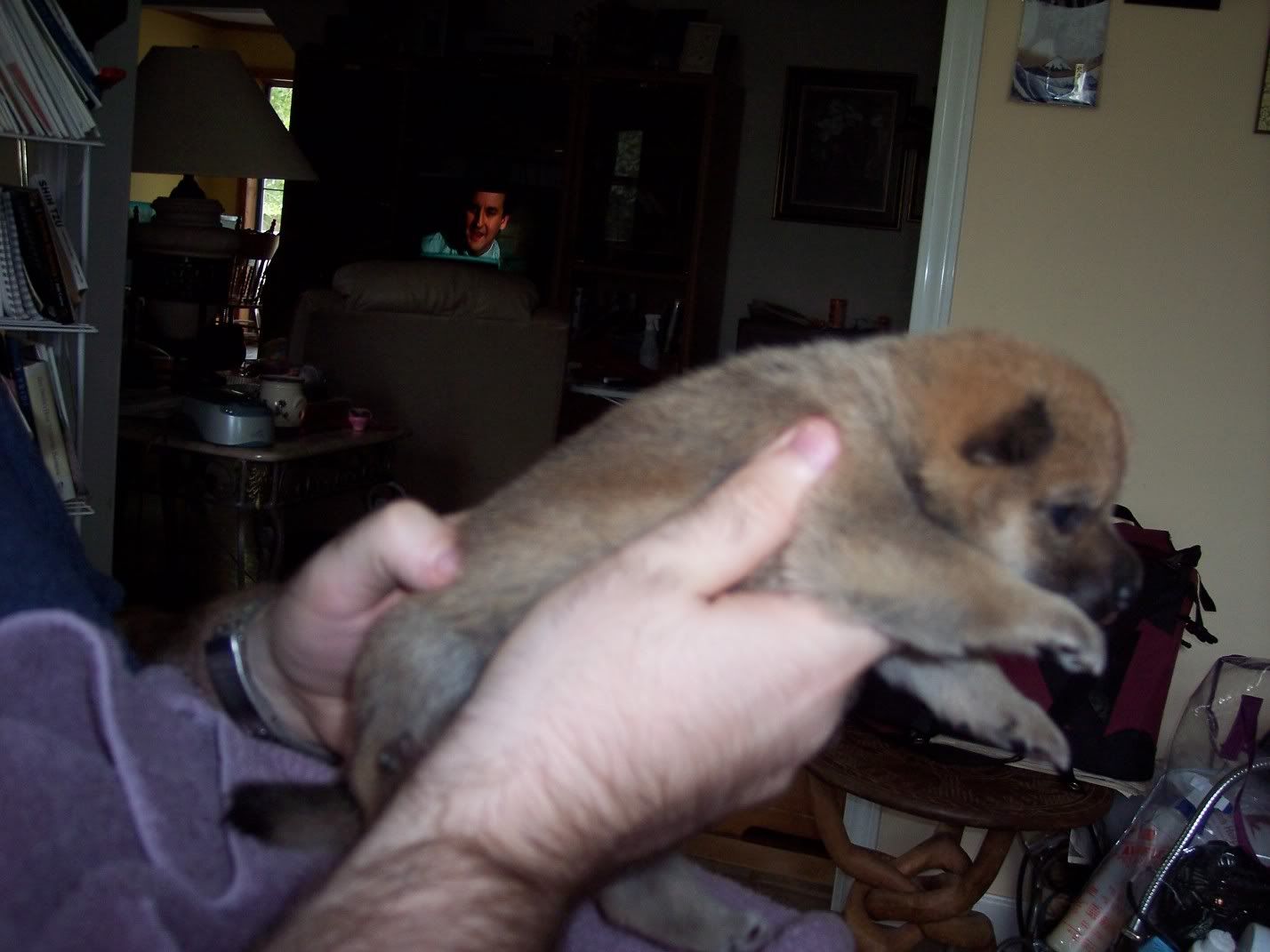 Chad holding puppy