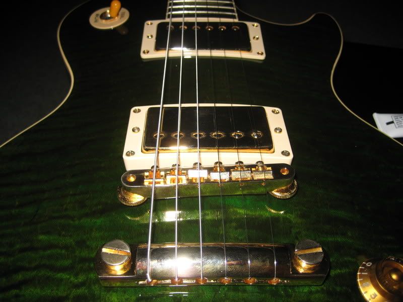 Wrapping strings around the tailpiece? My Les Paul Forum