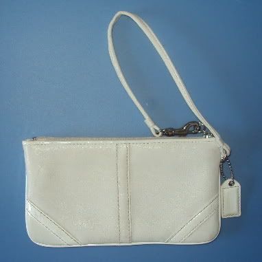 white coach wristlets