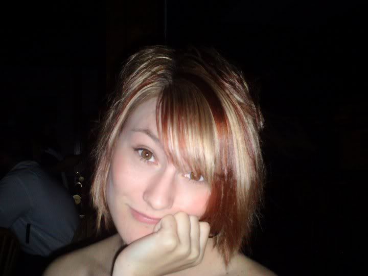 highlighted blonde hair. Hair: Red, londe highlighted.