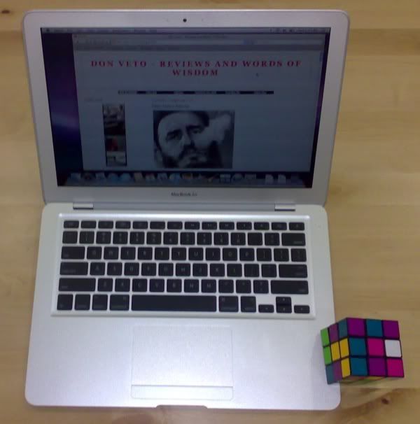 Macbook Air against Rubik's cube