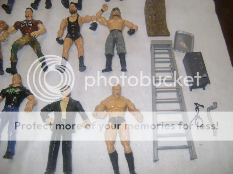   Lot 24 Figures Accesories WWE TNA Suicide Batista Rock Taker  